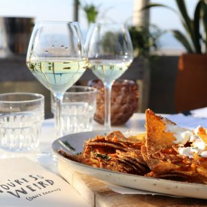 nachos served on white ceramic plate